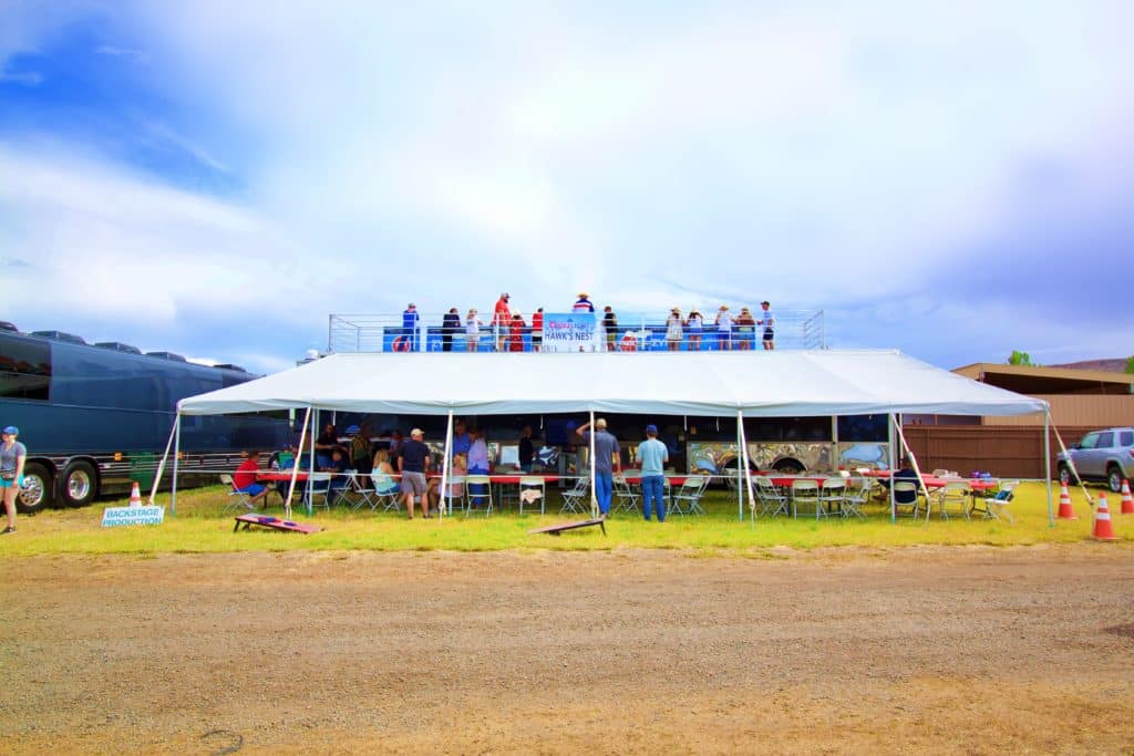 people on a mobile hospitality trailer