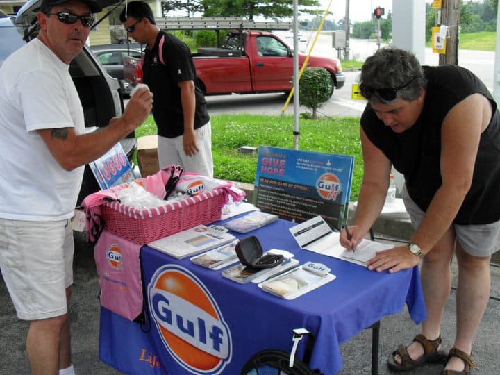 People at Gulf Oil tent