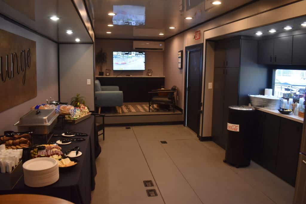 lounge area with sofa and TV