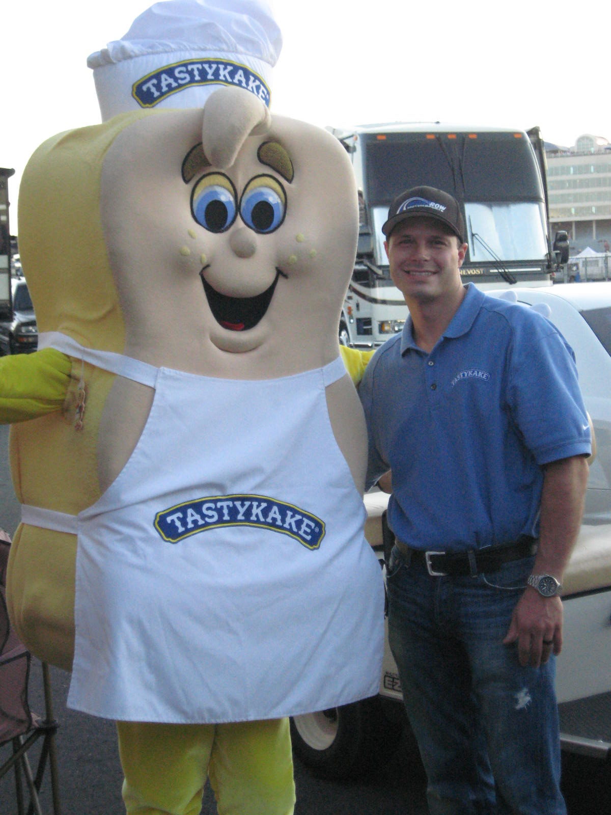 Man posing with Tastykake mascot