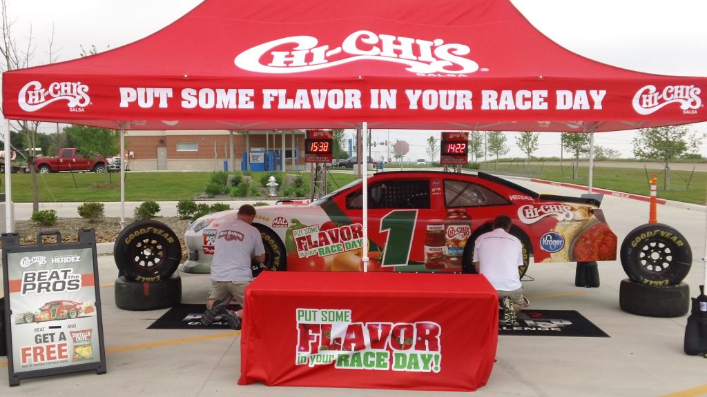 race car display under a tent