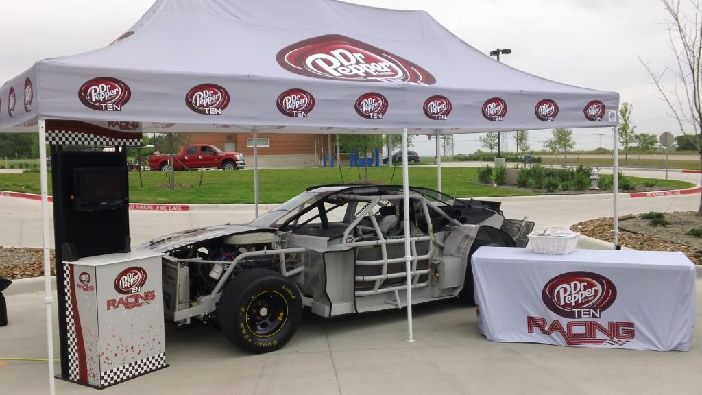 race car display under a tent