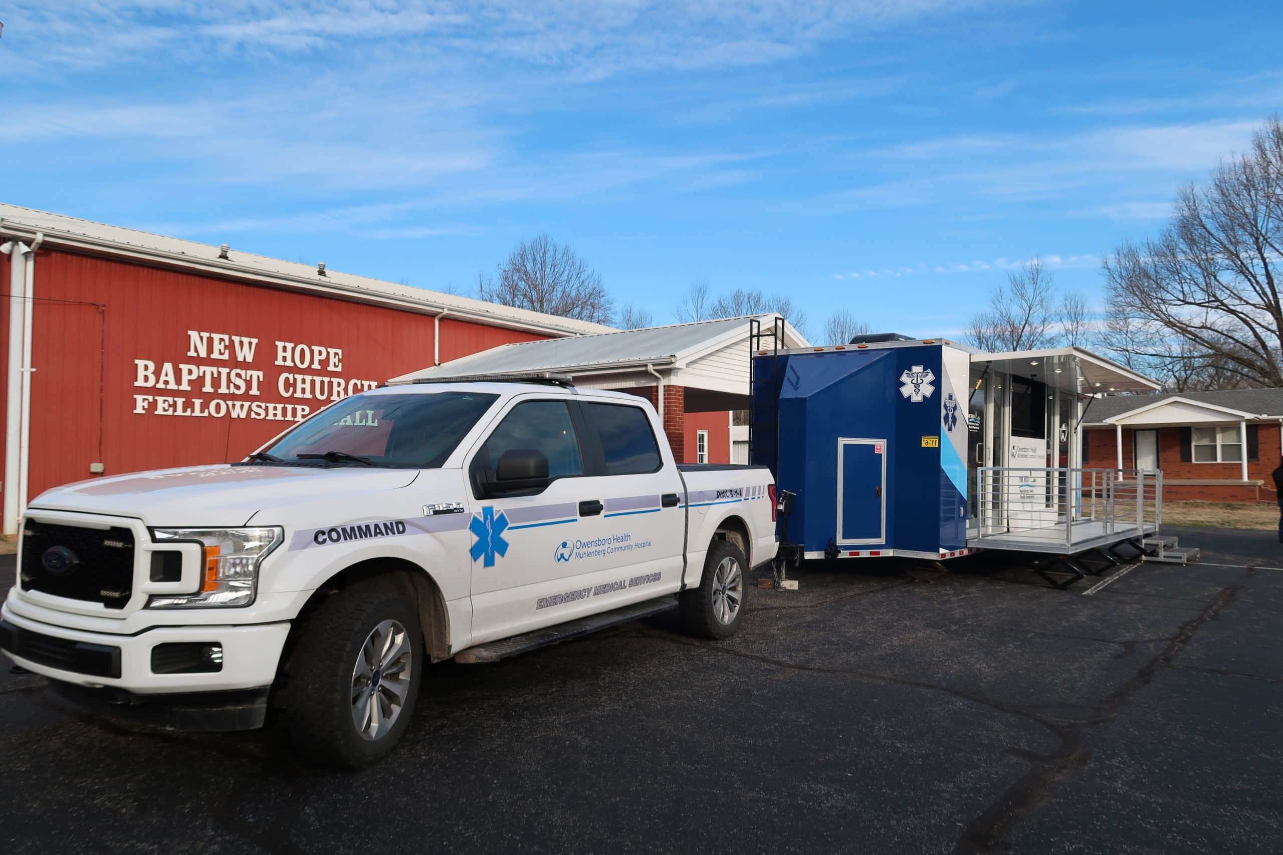 OHMCH Exterior of Mobile Trailer with white Truck