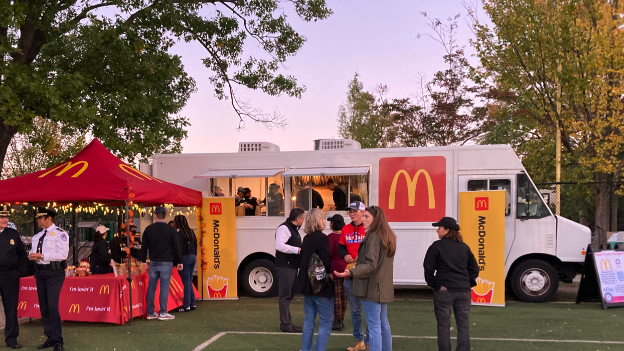 People at the McDonald's food truck and tent