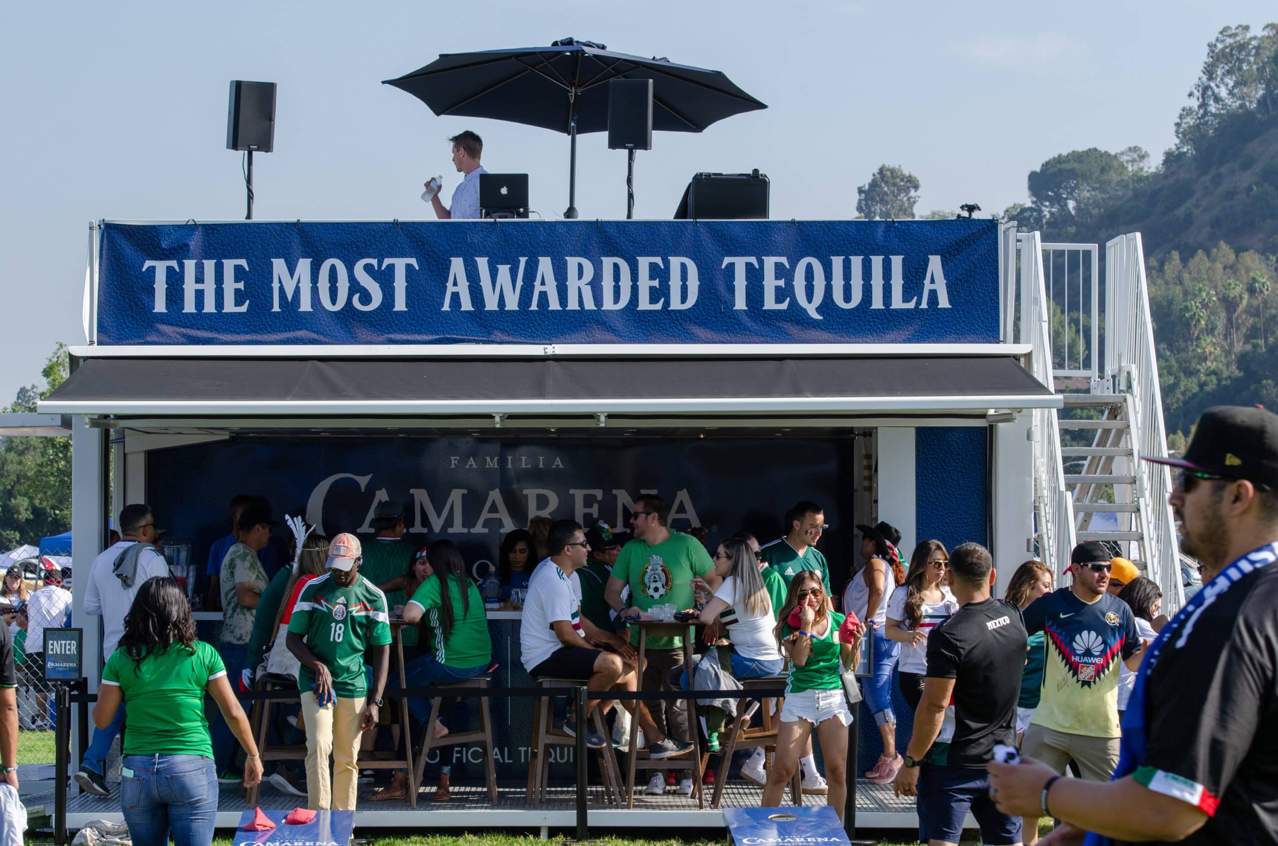 people gathered at a mobile bar