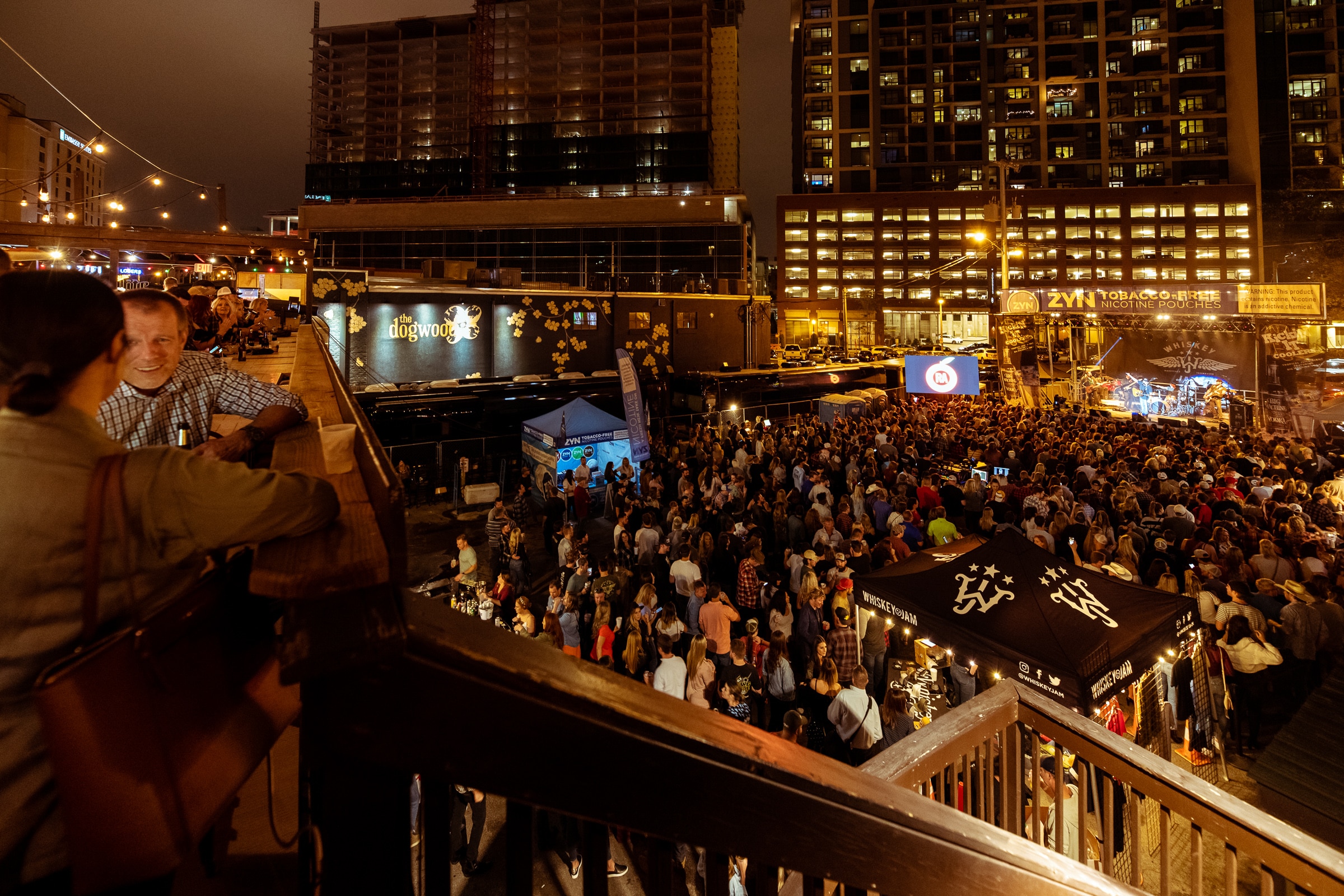 A large crowd watching a concert