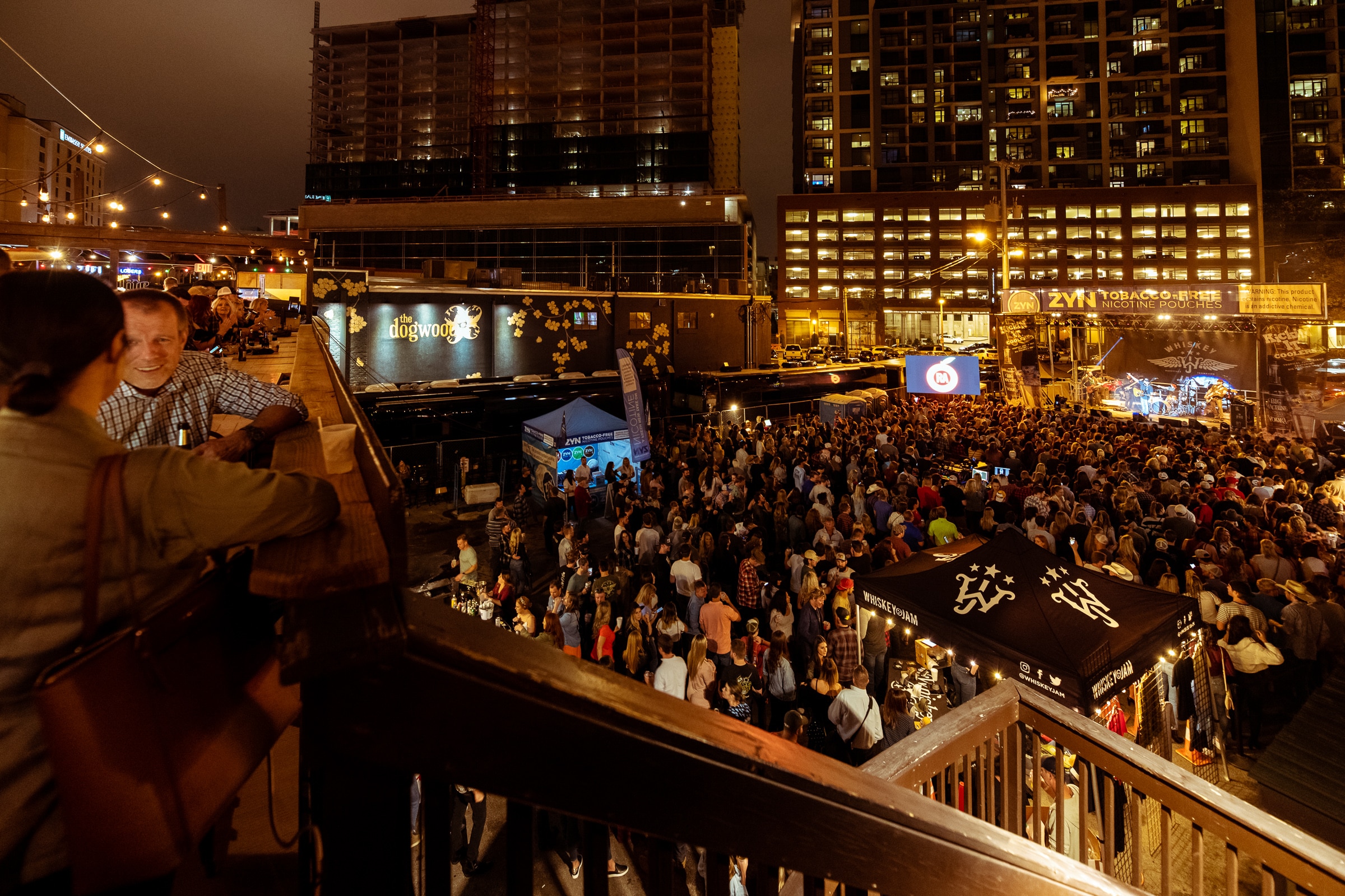 A large crowd watching a concert